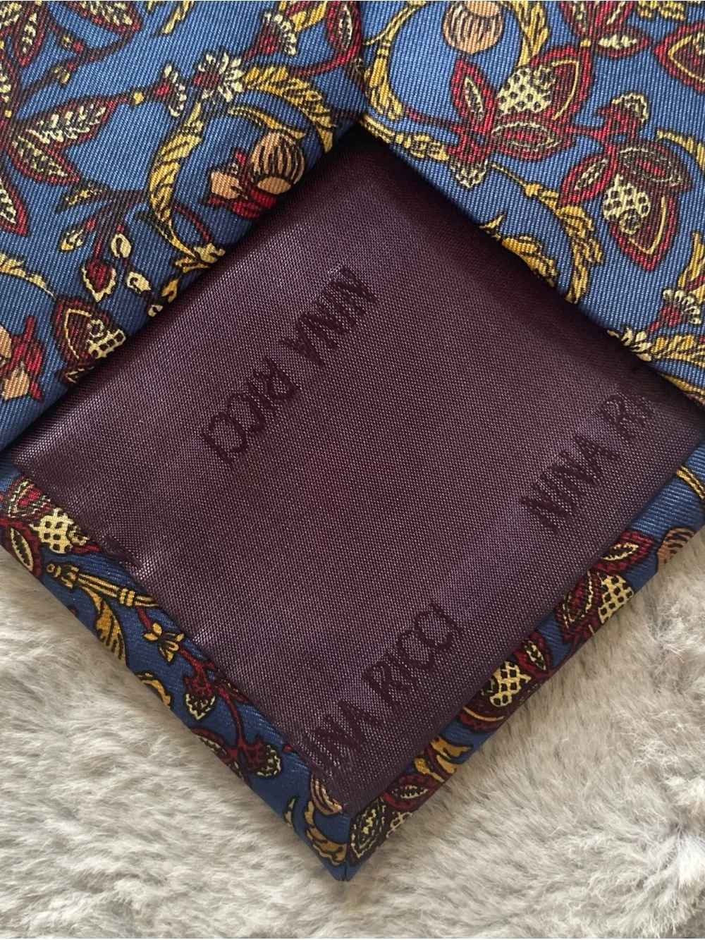 Nina Ricci Blue Tie with Gold and Burgundy Paisley